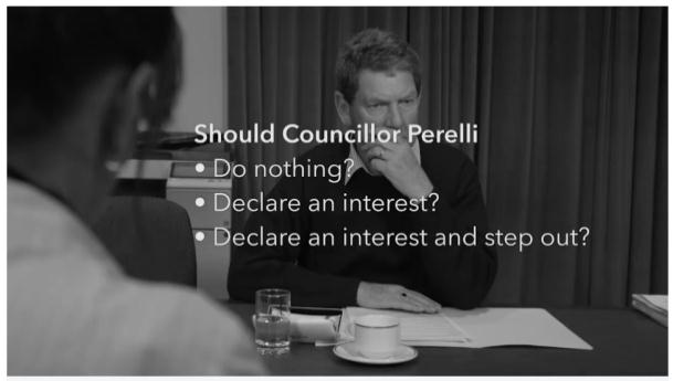 This is a screen shot from the video showing Councillor Perelli thinking about his actions