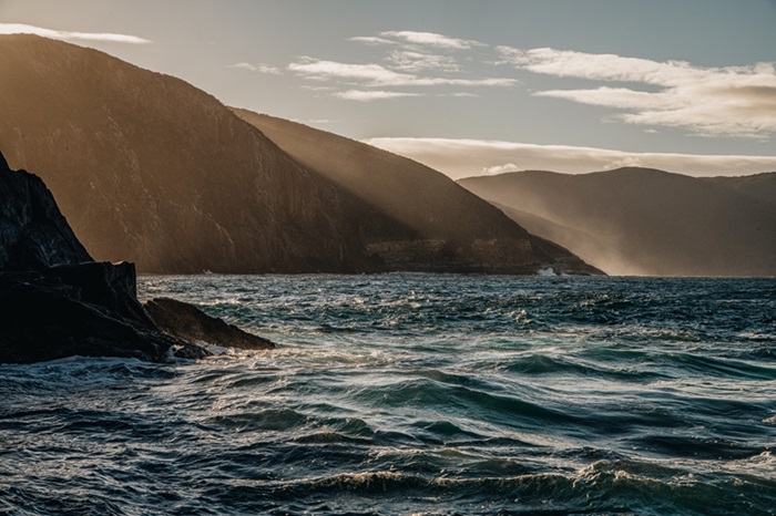High rocky cliffs and a rough sea