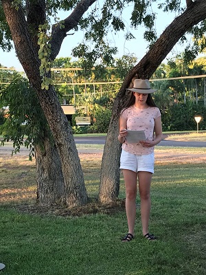 Katie Johnson reading her report in Katherine, Northern Territory