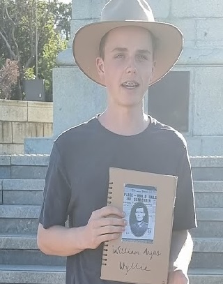 Elijah Hughes with an image of William Angus Wyllie