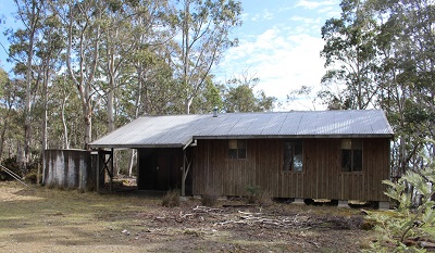 A timber shack in bush setting