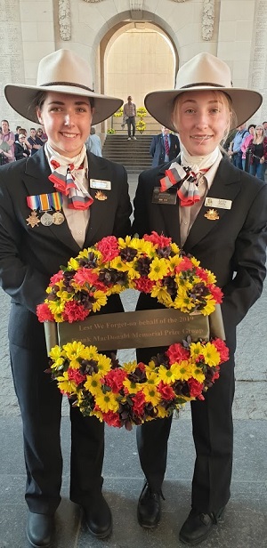 Two young women with a wreath