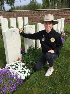 Lydia Kelly at a World War One grave