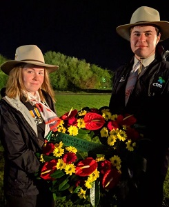 Mia Cooper and William Scott with the Frank MacDonald Memorial Study Tour wreath