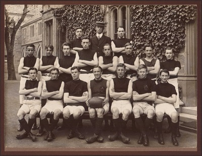School group posed for football team photo