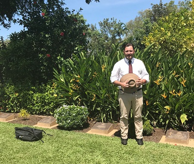 Felix Ellis standing in the Adelaide River War Cemetery