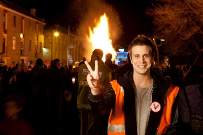 A volunteer at a festival in Salamanca Place, Hobart