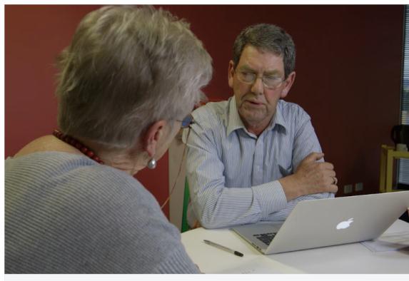 This is a screen shot from the video showing Councillor Perelli talking to a  community club officer 